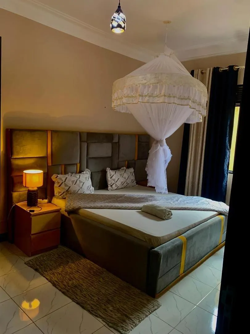 Апартаменты Js Summer Cottages Кампала